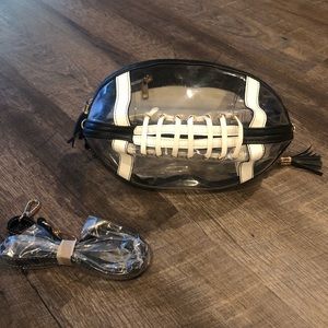 clear football shaped purse